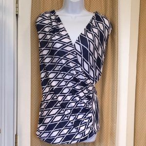 Never worn! Medium sleeveless top with sexy plunging neckline, from Stitch Fix!